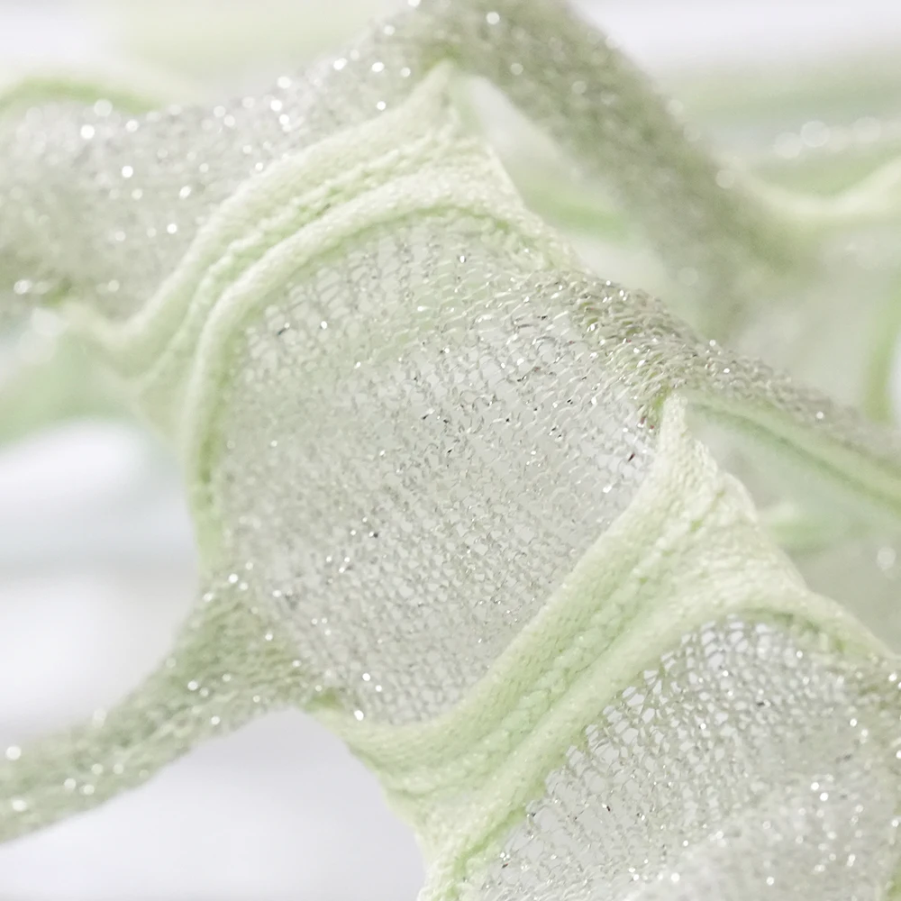 High Quality 100% Polyester Knitted Large Mesh Jacquard Fabric, Suitable for Designing Creative Skirts 105